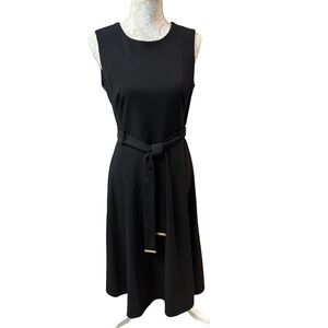 Calvin Klein-Elegant Black Sleeveless Dress
Women’s Size  8